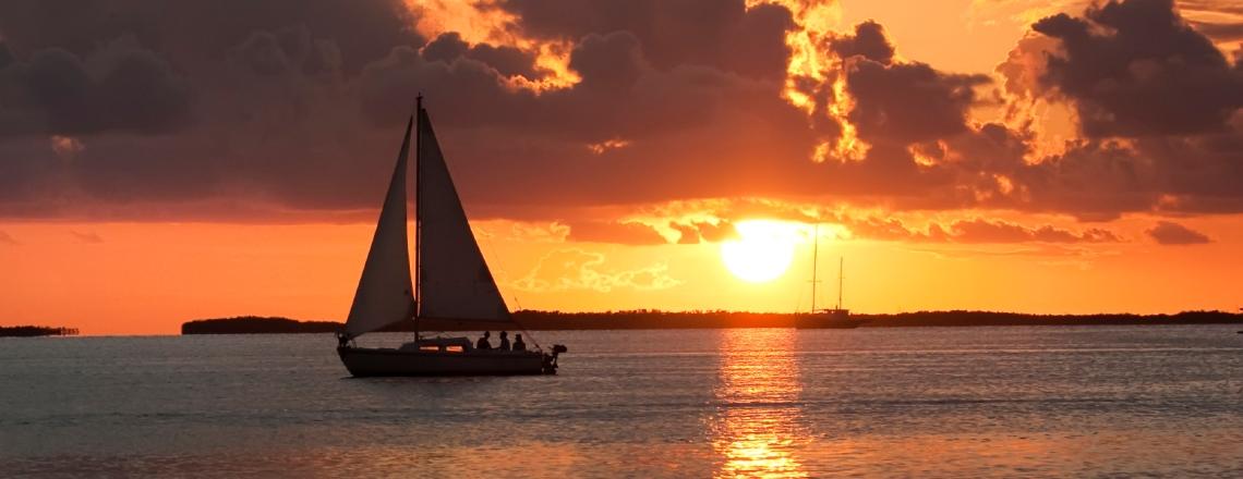 Boat on Calm Water at Sunset